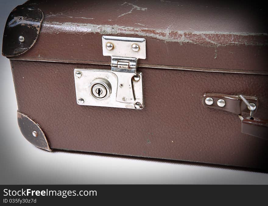 Vintage suitcase with a lock in close up