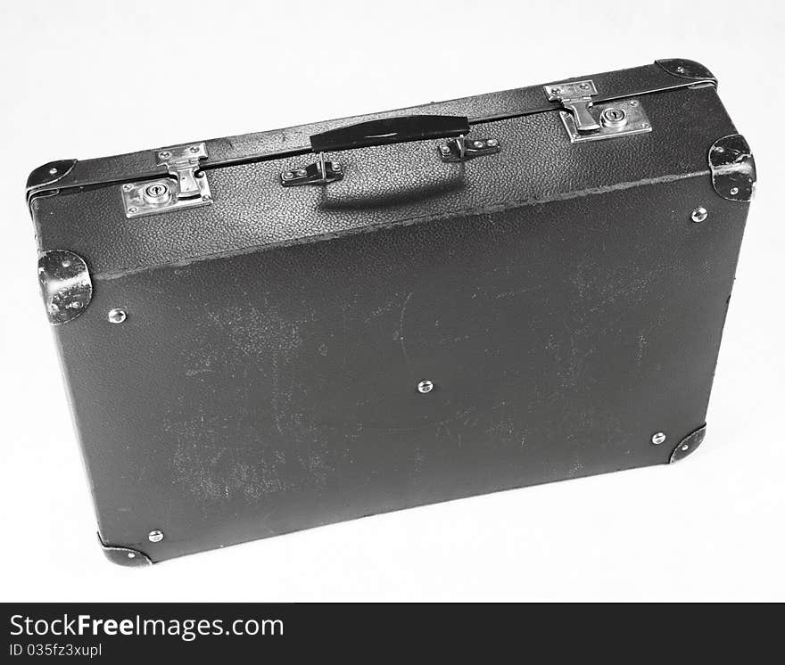 Vintage suitcase in black and white on white background