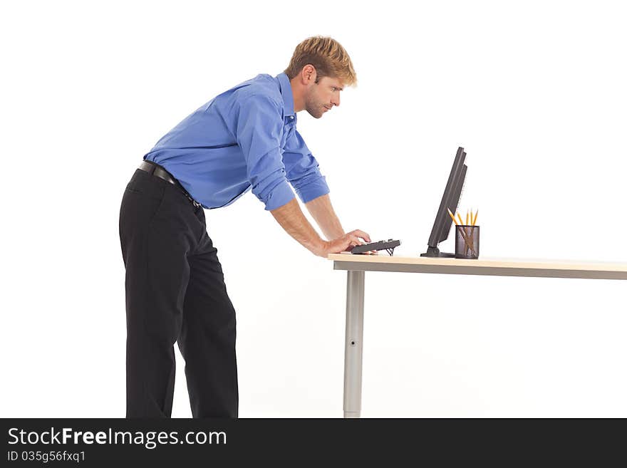 Businessman working on computer at desk