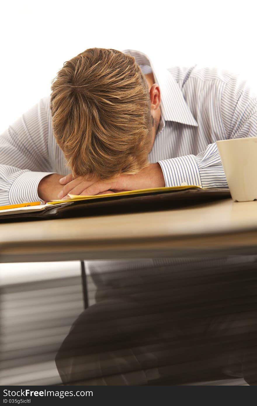 Businessman sleeping at desk