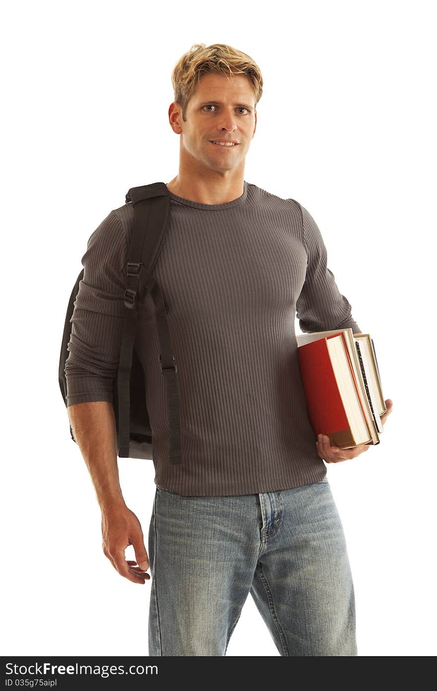 Young male student with books and backpack. Young male student with books and backpack