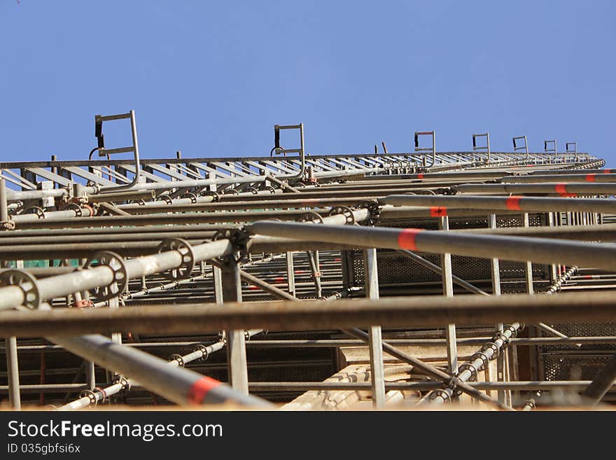 An building restauration with a giant scaffold. An building restauration with a giant scaffold