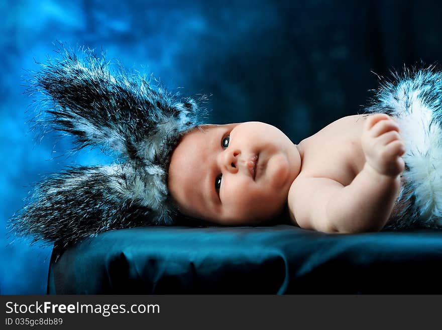 Portrait of a beautiful baby in rabbit costume.