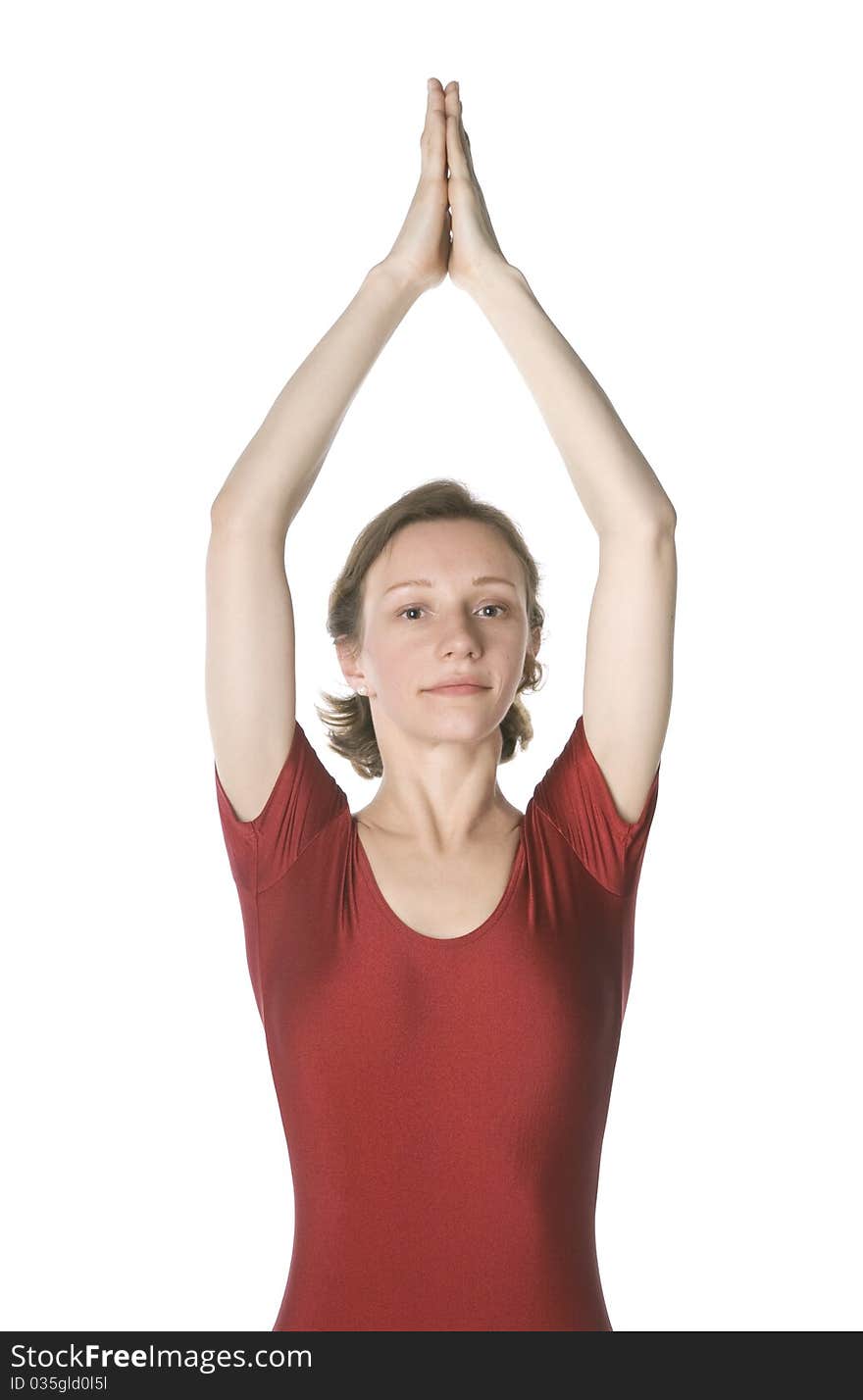 Woman in a red leotard exercising over white background. Woman in a red leotard exercising over white background