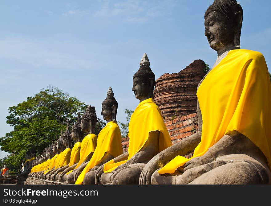 Stone statue of a Buddha in the old temple