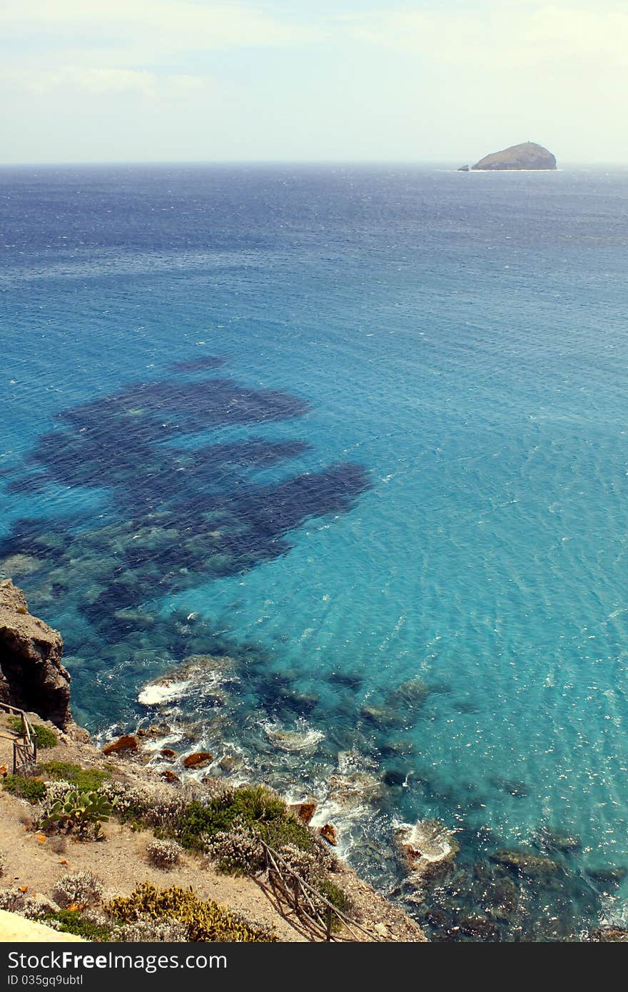 A lonely island lost in the mediterranean sea. A lonely island lost in the mediterranean sea