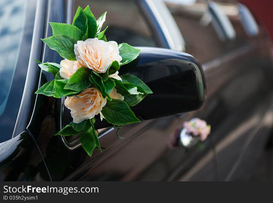 Beautiful flower decoration on mirror of the car