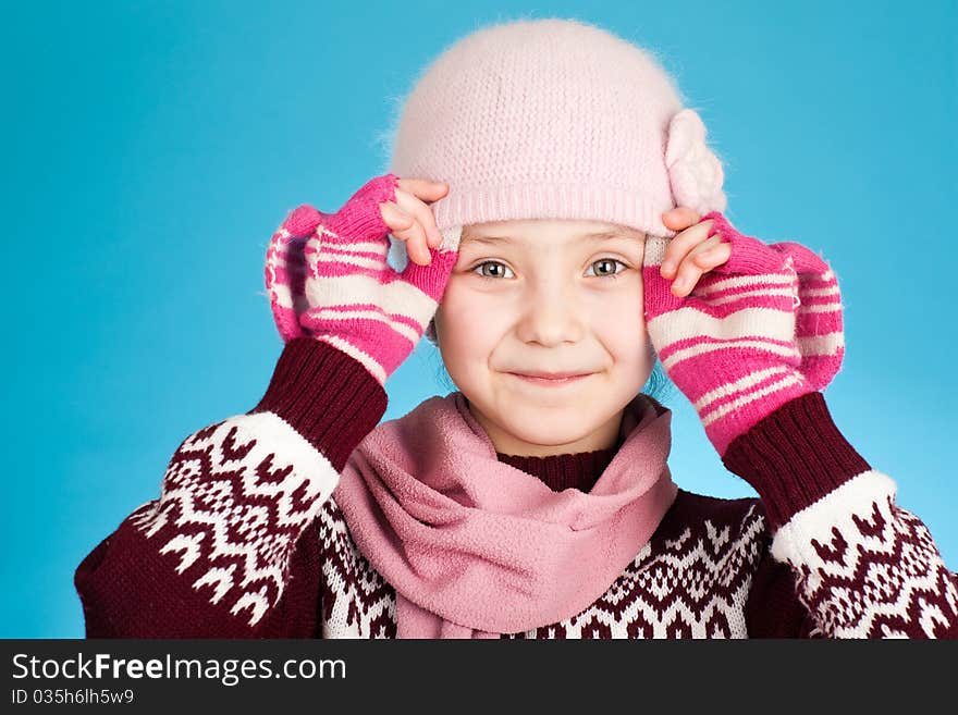 Little girl on blue background