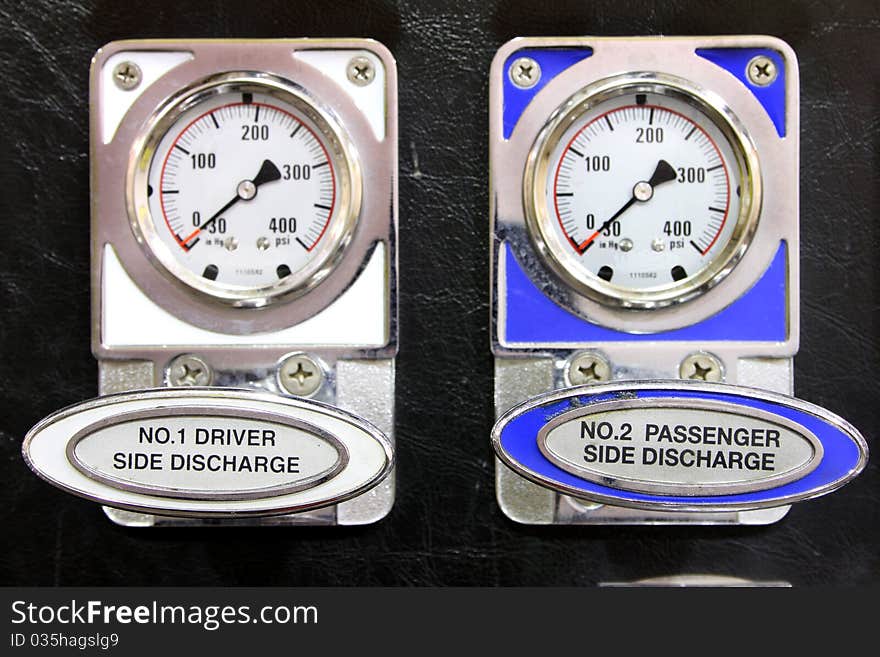 Gauges on the side of a fire truck. Gauges on the side of a fire truck.