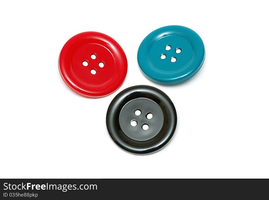 Three colored buttons isolated over white background