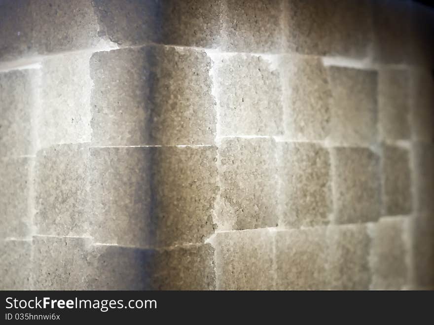 Edge of cube made from sugar blocks in backlight. Edge of cube made from sugar blocks in backlight