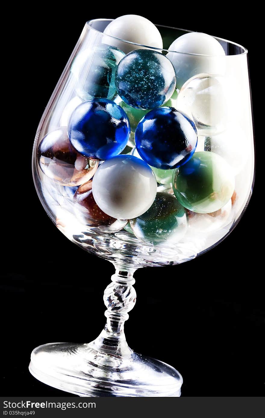 Glass balls in snifter