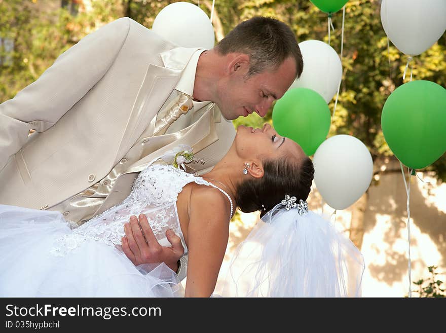 Happy married couple. Photosession on open air. Happy married couple. Photosession on open air.