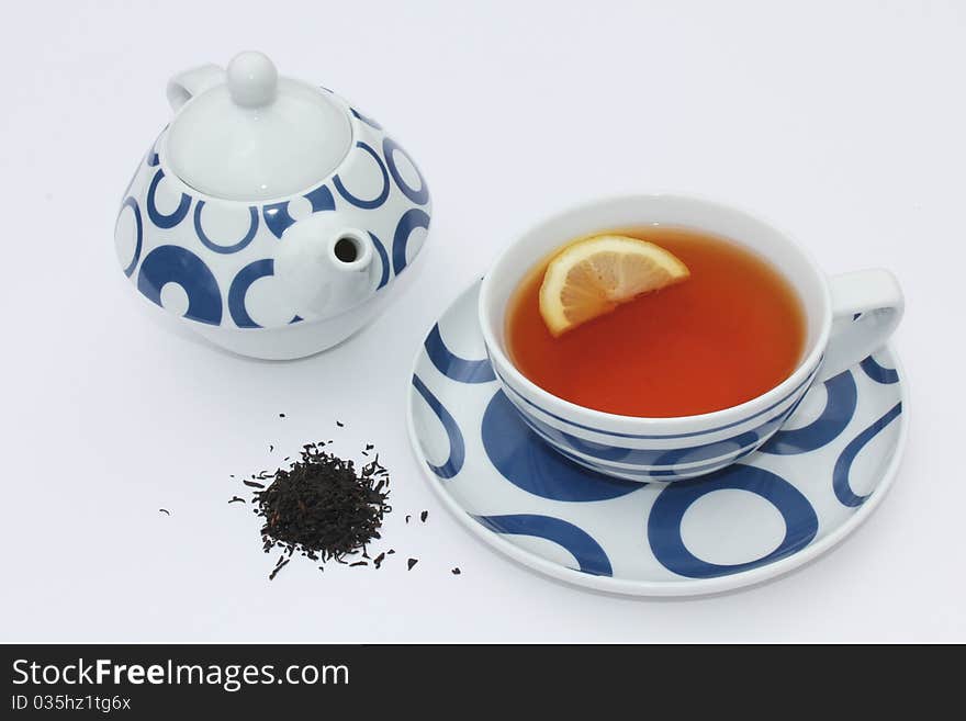 Teacup and Teapot with Loose Tea leaves