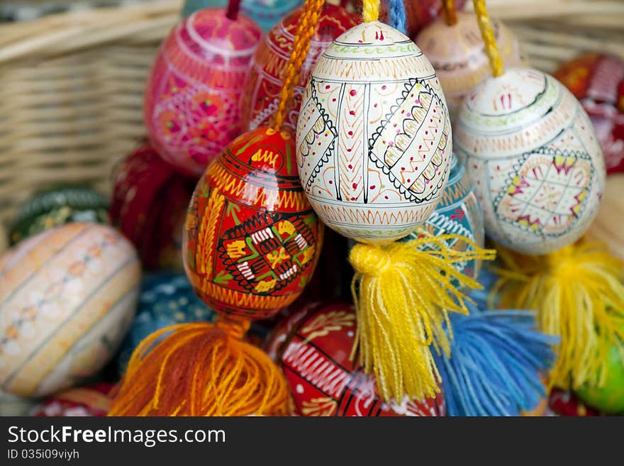 Wattled basket with multi-coloured Easter eggs. Wattled basket with multi-coloured Easter eggs