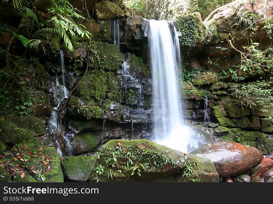 Beautiful Waterfall In Deep Forest.