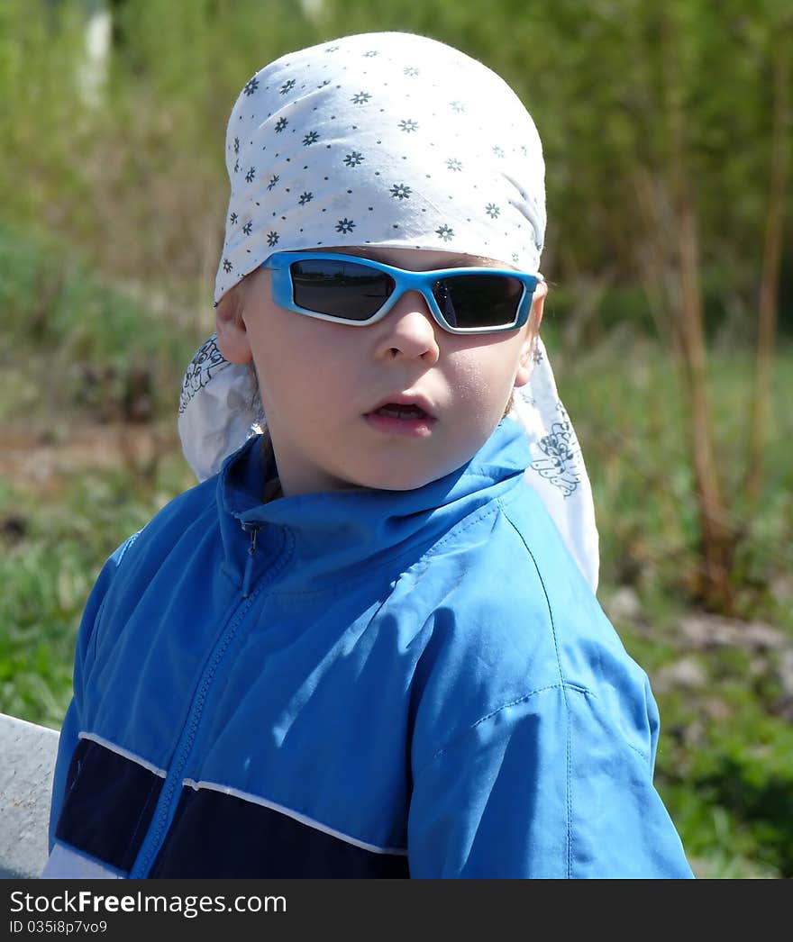 Portrait of a Boy in a bandana.