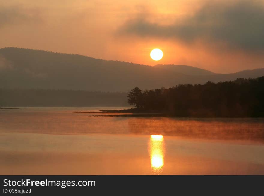 Sunrise over the lake in Phayao Province, Thailand.