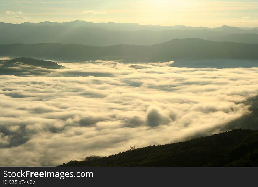 Sea of fog on the piling-up mountains seen here are view from Doi Samoe Dao, Sri Nan national park, northern of Thailand.