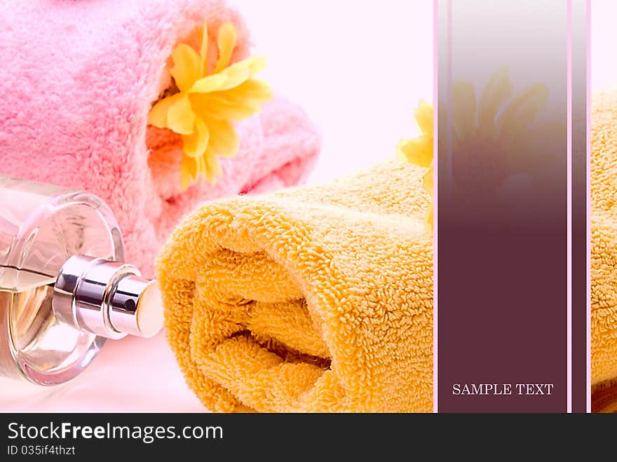 Spa composition of towel and flower