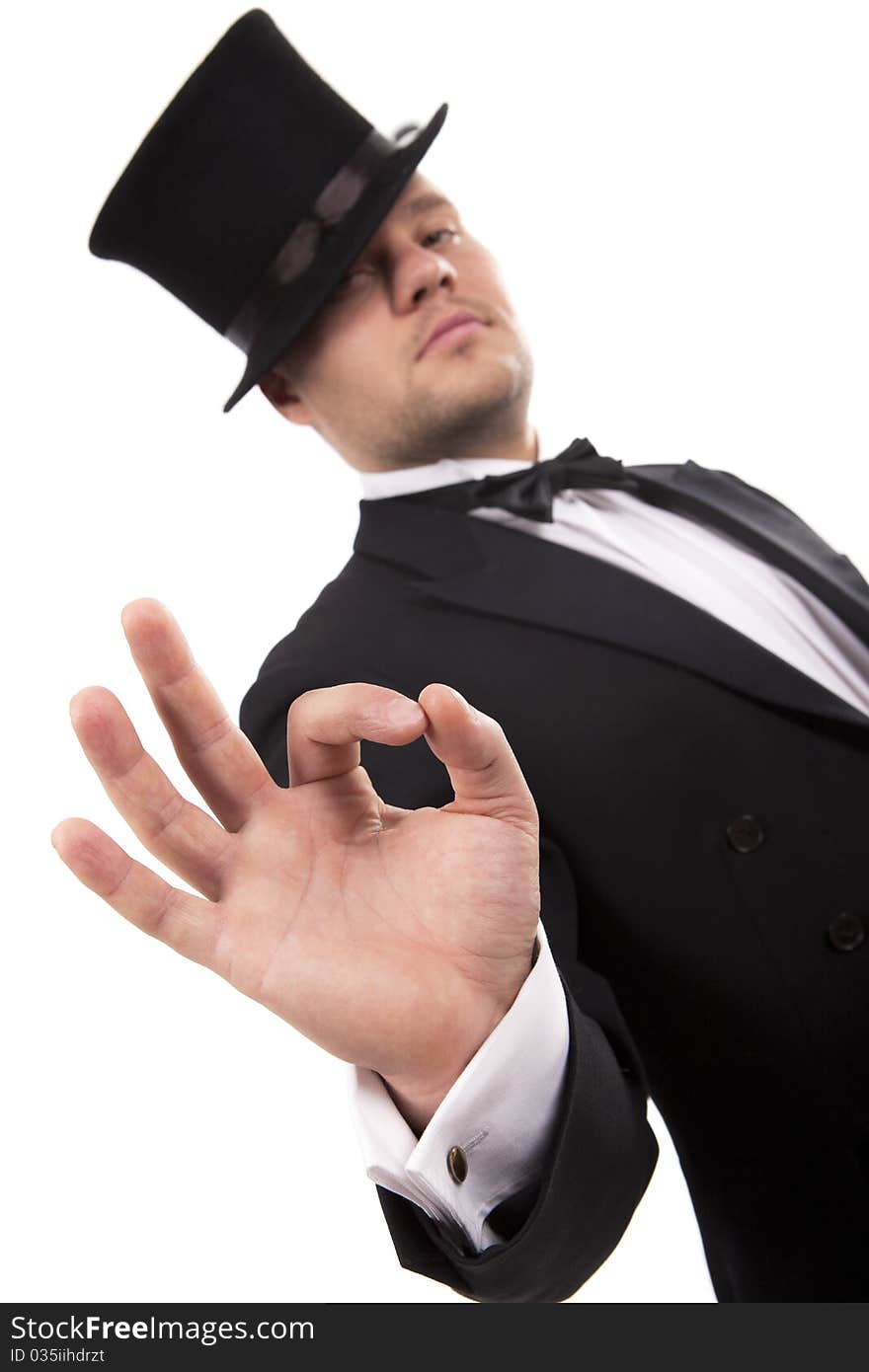 Man with top hat making 'ok' gesture. Man with top hat making 'ok' gesture