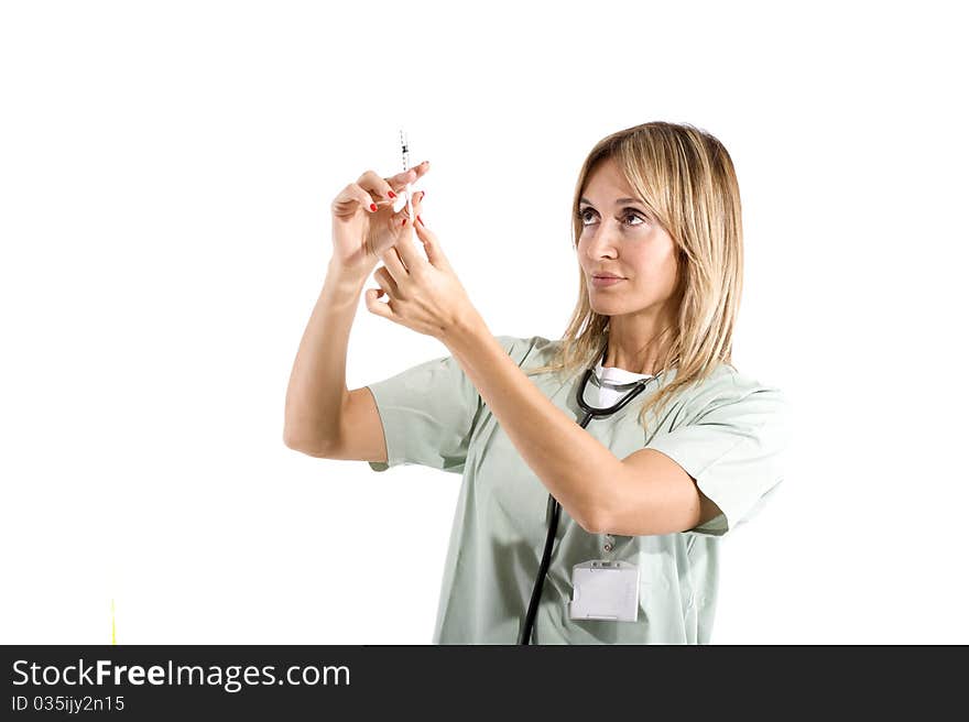 Smiling confident medical staff holding a syringe. Smiling confident medical staff holding a syringe