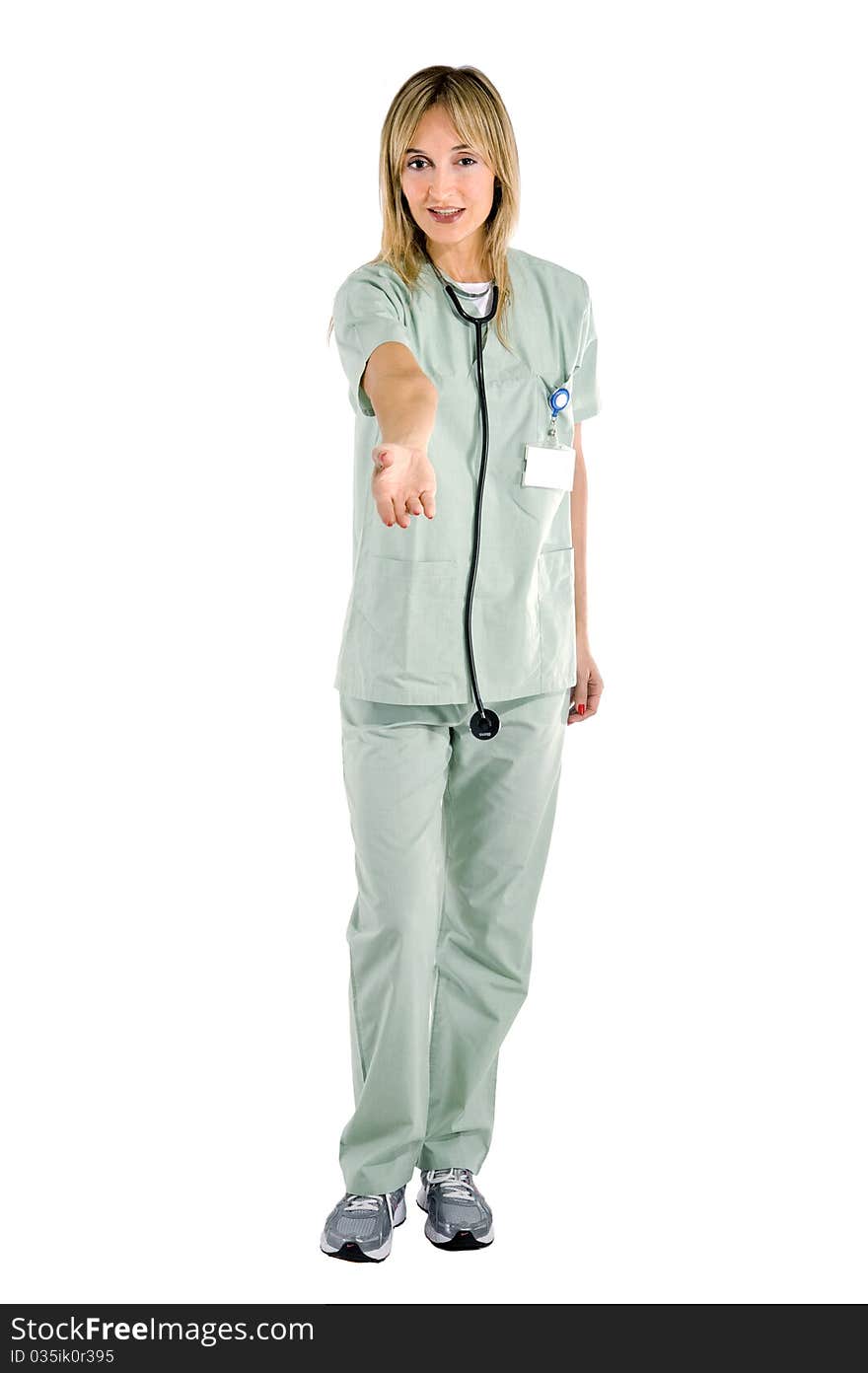 Smiling confident medical staff standing in her uniform. Smiling confident medical staff standing in her uniform