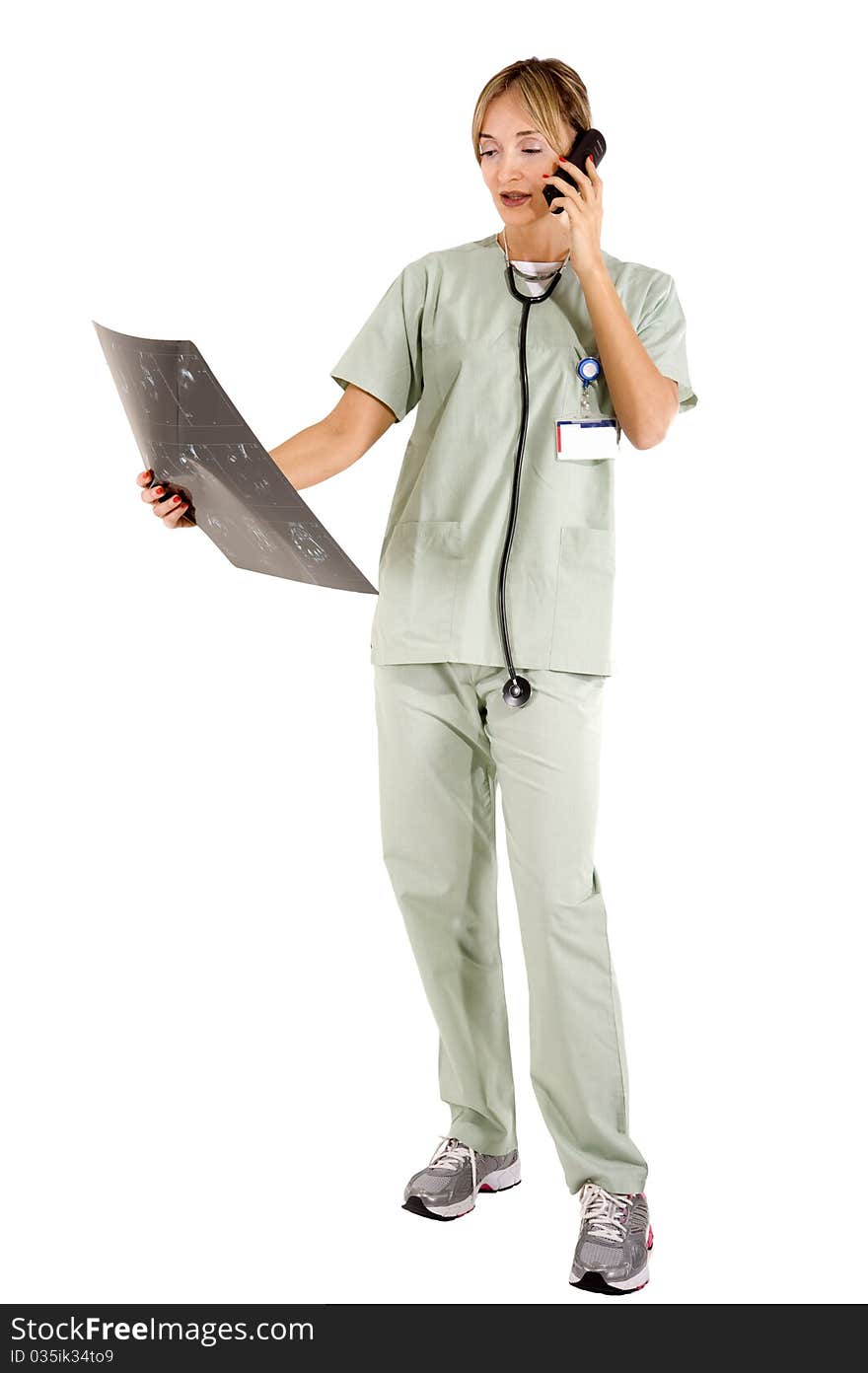 Smiling confident medical staff on the phone with a patient about test results. Smiling confident medical staff on the phone with a patient about test results