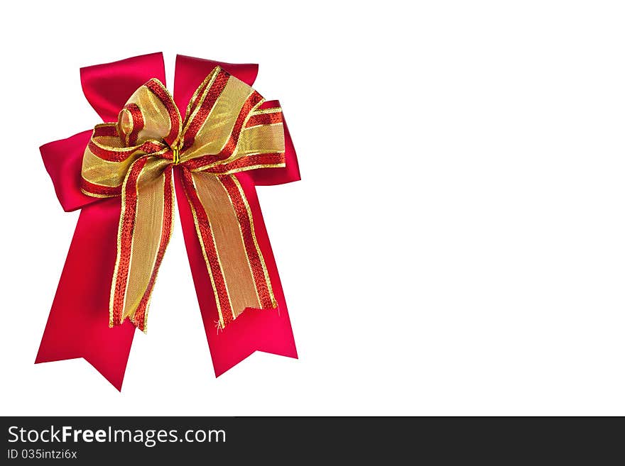 Red gift bow over white background. Red gift bow over white background