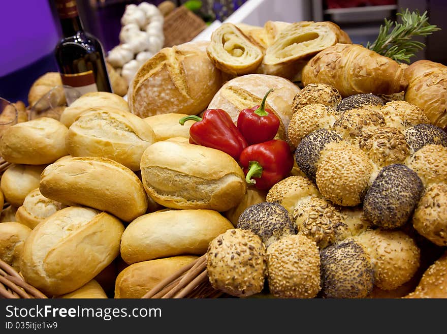 Bread background with wine bottle