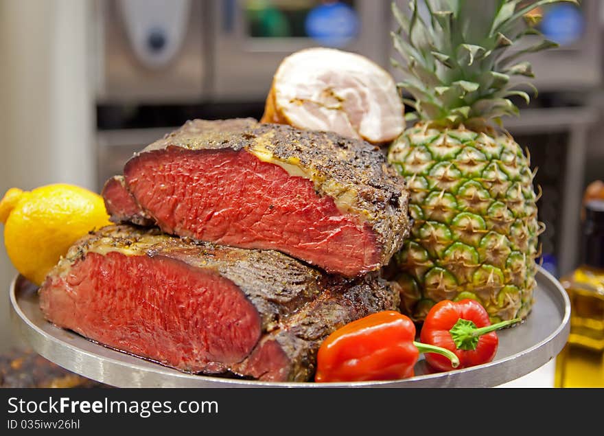 Meat and vegetables in assortment on tray. Meat and vegetables in assortment on tray