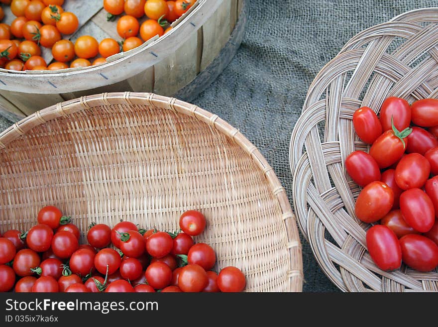 Baskets of three varieties of cherry tomatoes