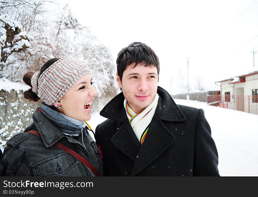 Young couple having fun outdoors in winter. Young couple having fun outdoors in winter