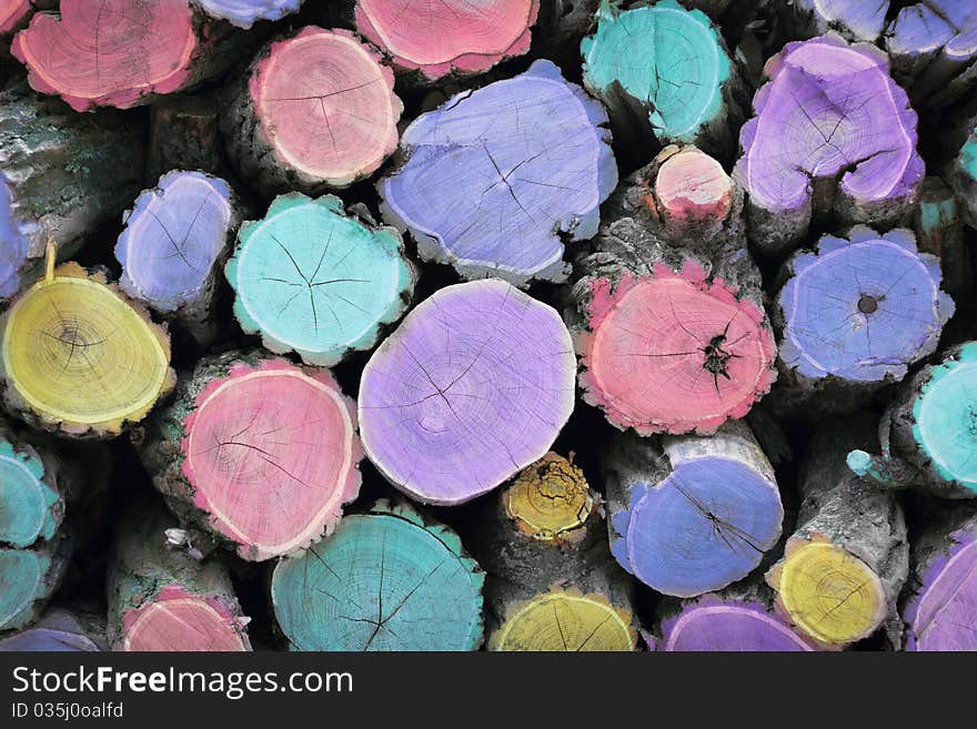 Fire wood. Multicolored woodstack background