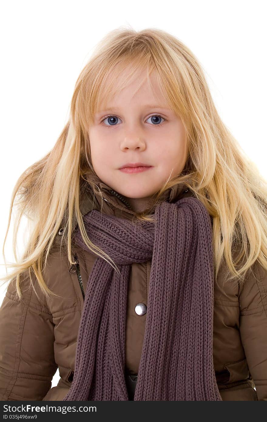 Little blonde girl - child in street clothes