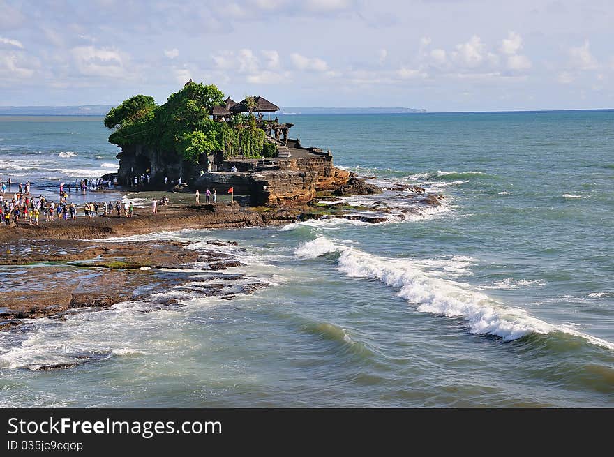 Tanah lot, the name means sitted on rocks. It is the most popuclar temple in bali. Tanah lot, the name means sitted on rocks. It is the most popuclar temple in bali.