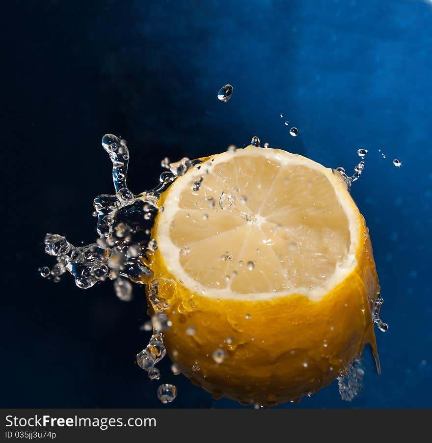 Water splash on a lemon