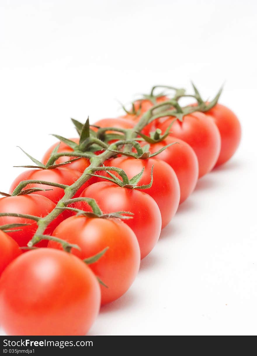 Ripe Tomatos cherry on white background. Ripe Tomatos cherry on white background