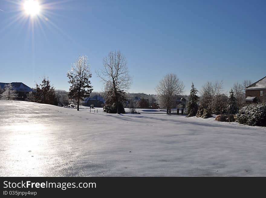 A frozen ice covered golf course. A frozen ice covered golf course