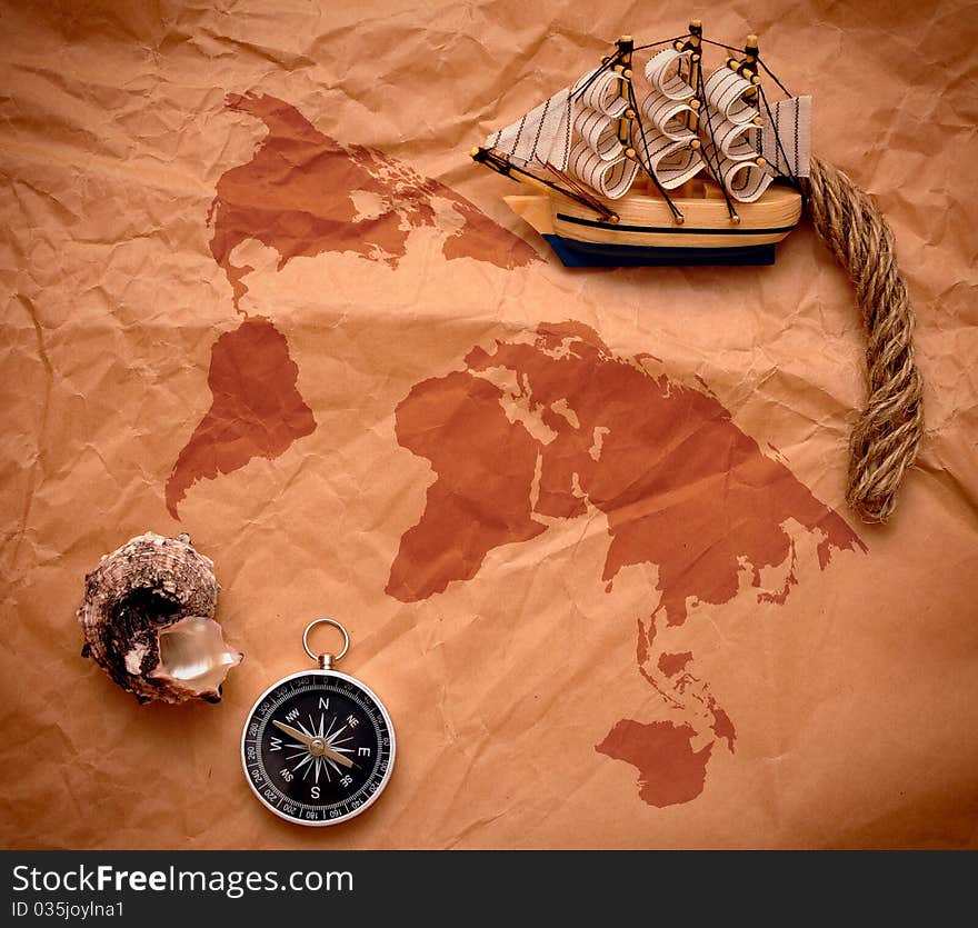 Compass, shell and model classic boat on grunge background. Compass, shell and model classic boat on grunge background