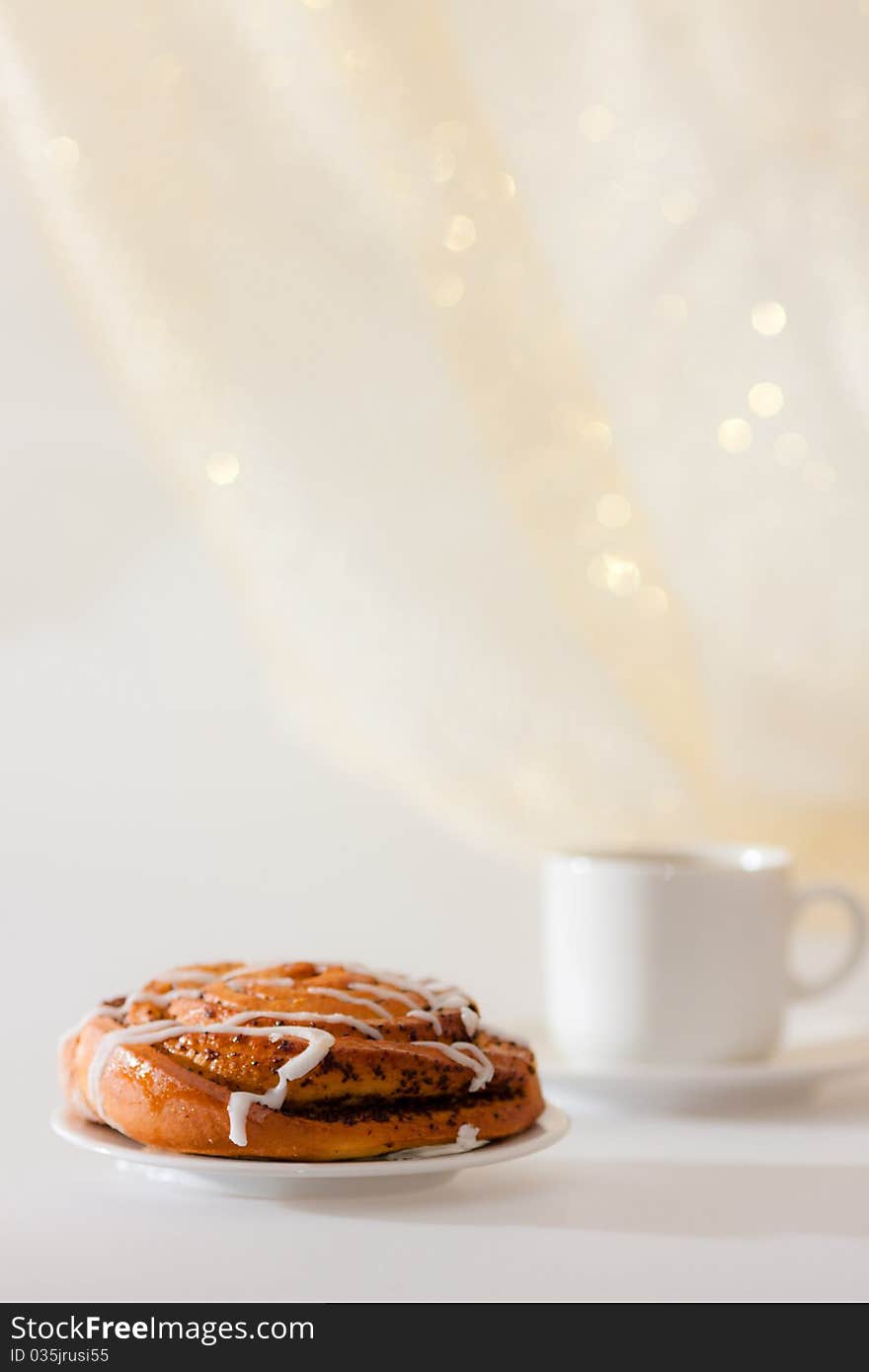 Delicious thin captain on a saucer and cup of tea