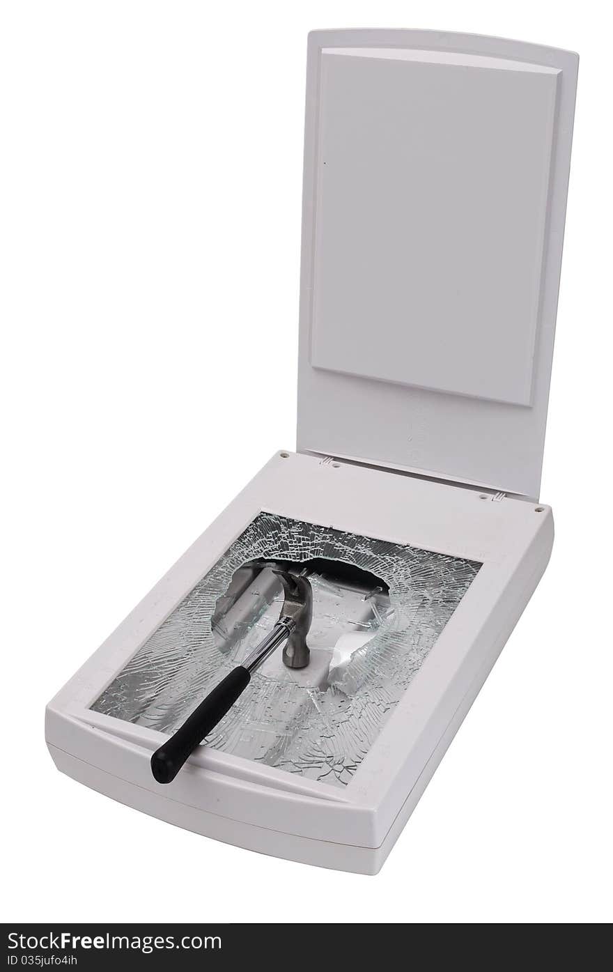 Flatbed scanner with hammer through broken scanning plate. Isolated on white background with clipping path. Flatbed scanner with hammer through broken scanning plate. Isolated on white background with clipping path.