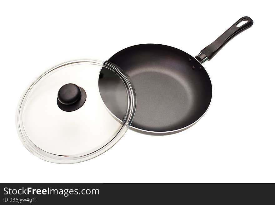 Frying pan with a glass cover it is isolated on a white background. Frying pan with a glass cover it is isolated on a white background