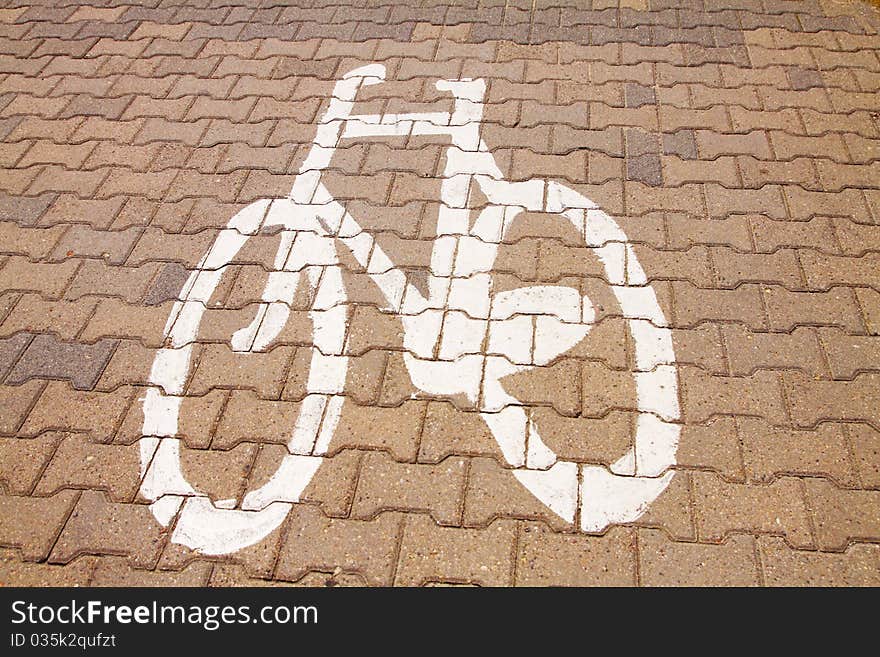 Bicycle symbol painted on pavement. Bicycle symbol painted on pavement