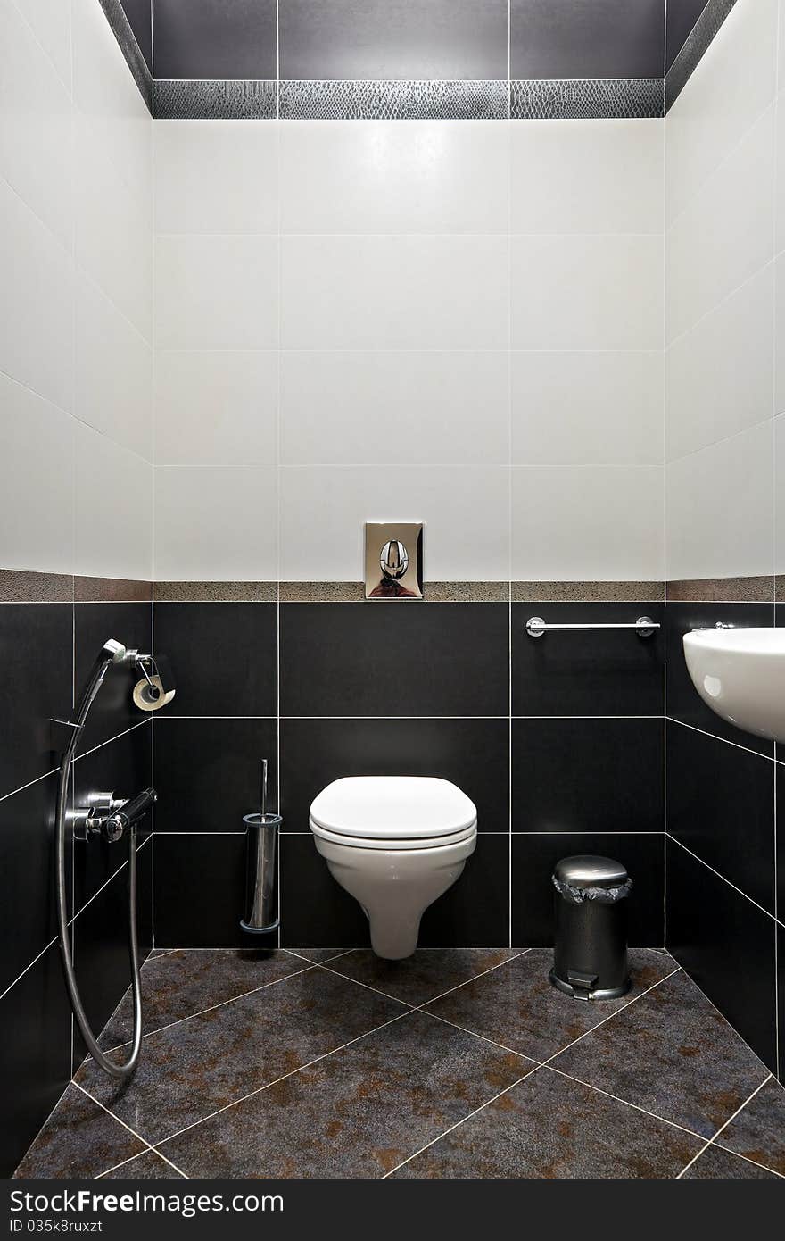 Interior of restroom in black and white colors. Interior of restroom in black and white colors