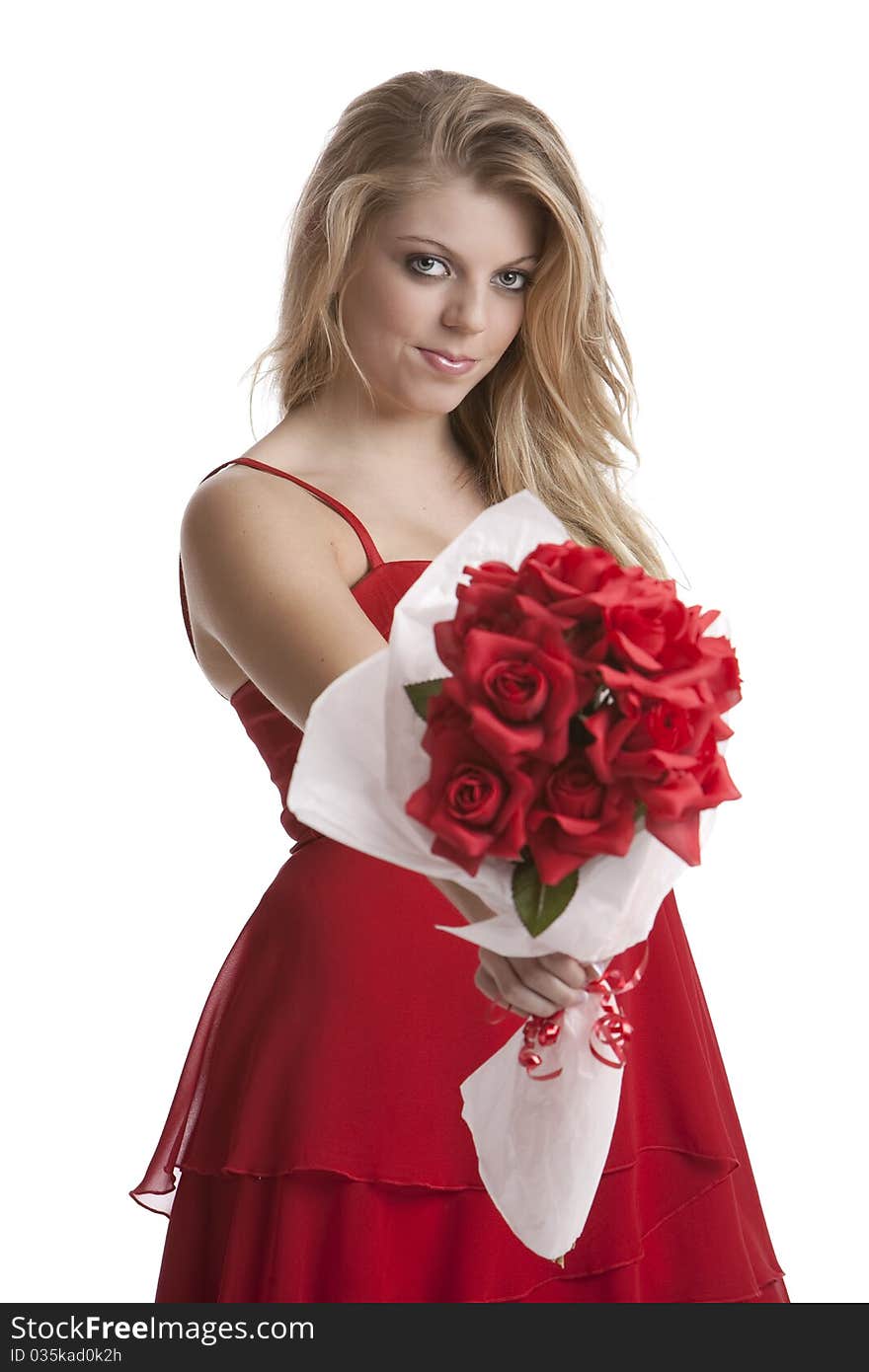 Teenage girl in a red dress holding a bouquet