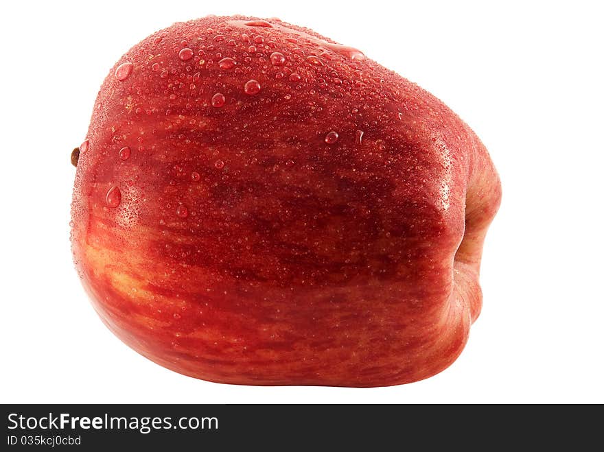 Red apple in the dew isolated on a white background