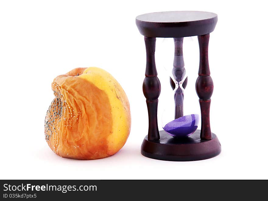 Rotten Apple With A Mold And An Hourglass