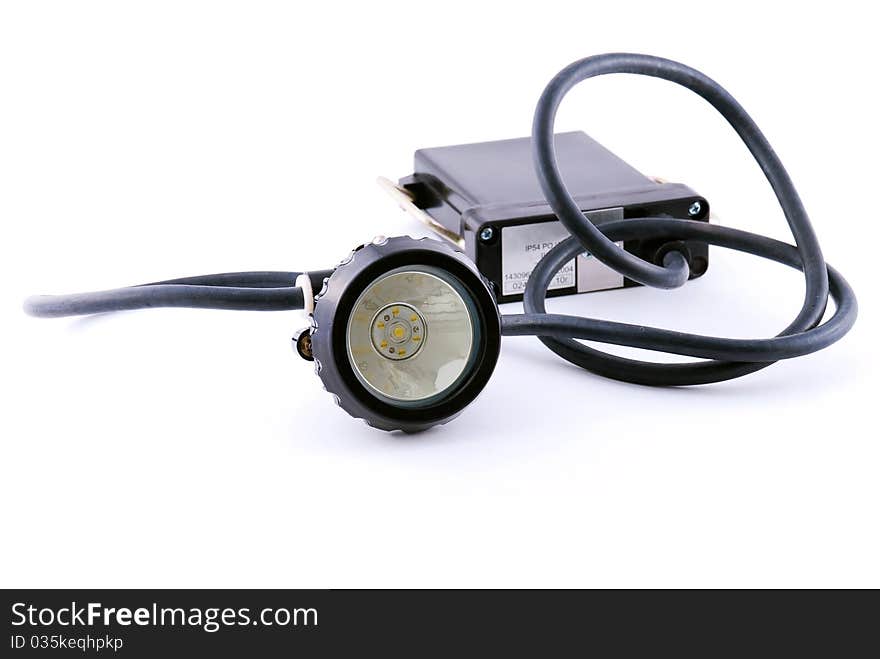 Miner's lamp isolated on white background