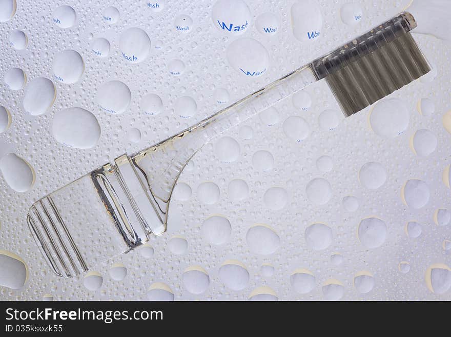 Teeth brush and water droplets